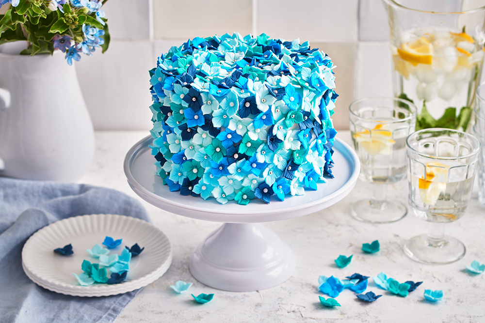 blue and silver wedding cakes with flowers